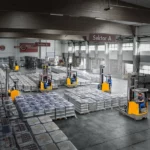 Implementazione del nuovo layout con transpallet nel settore di stoccaggio 
